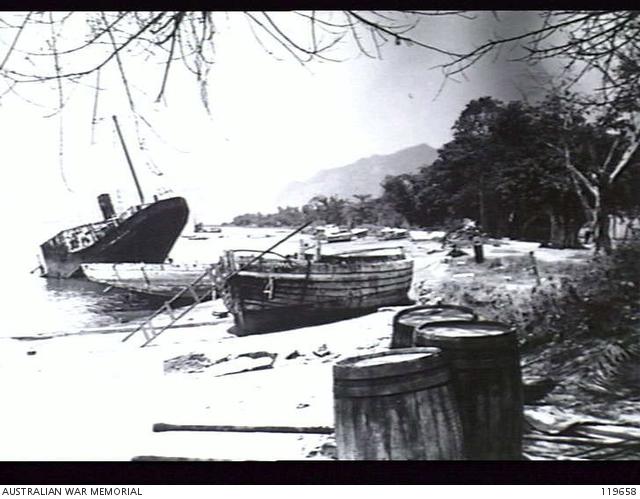 Dili harbour beach - derelict vessels, etc. 1946.JPG