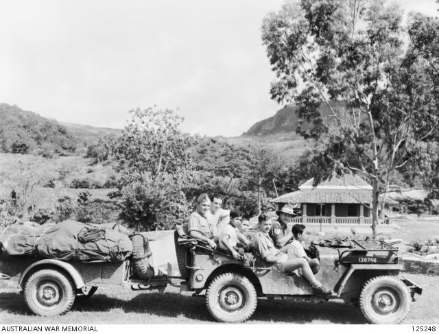 1108653193_125248-OssuPortugueseTimor.MembersoftheMilitaryHistoryFieldTeamandlocalchildrenintheteamsJeep....jpg.407684e865754293e198c00c4b3e0dad.jpg