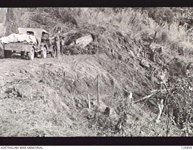1495666173_125405-MUREMAPORTUGUESETIMOR.1946-01-25.THEMILITARYHISTORYSECTIONFIELDTEAMHALTEDONTHEROADTOATSABEBYALANDSLIDE....jpg.ed56d7cfe35b957e1311b9e6226e685e.jpg