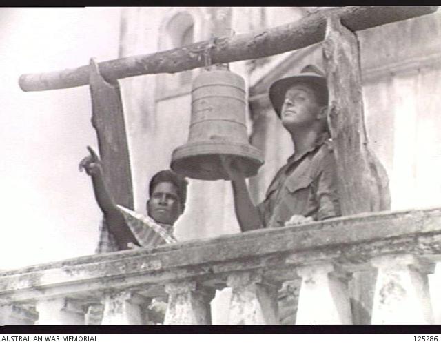 1923295972_125286-AINAROPORTUGUESETIMOR.1946-01-24.SERGEANTG.MILSOMMILITARYHISTORYSECTIONFIELDTEAMANDFORMERLYOFTHE22NDINDEPENDENTCOMPANYRE-ENACTS....jpg.c95332cc8d0443f64de642eec851f7db.jpg