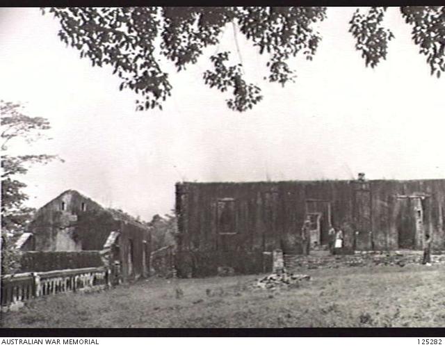 867237497_125282-AINAROPORTUGUESETIMOR.1946-01-23.SERGEANTG.MILSOMMILITARYHISTORYSECTIONFIELDTEAMAND-LONGSIDETHEAUSTRALIANSOUTSIDEWHATWASSPARROWFORCEBARRACKS....jpg.66b87ffb9254dfc41767b4544a2b11c3.jpg